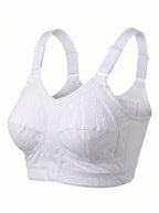 White wireless underwire bra with adjustable shoulder straps and a subtle lace pattern on the cups, shown against a plain white background.